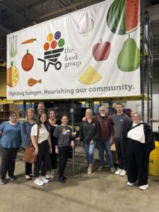 Relocation Today team members volunteering at The Food Group to support hunger relief in Minnesota